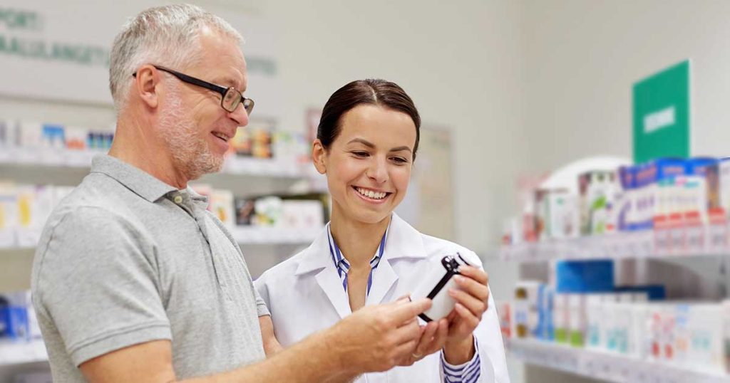 Pharmacist swapping out a biologic medication for a biosimilar so the patient can afford it.